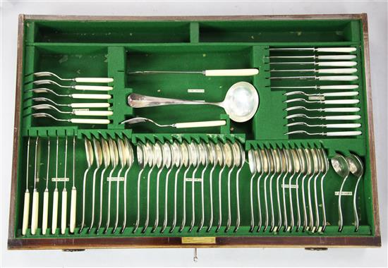 An early 20th century part canteen of silver plated Hanovarian pattern cutlery, width 33in.
